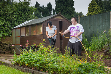 Image of service users in the garden